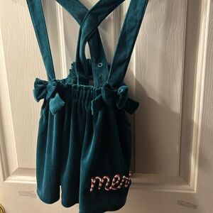 Bluey green velvet pinafore dress or romper with a "merry" embroidered.